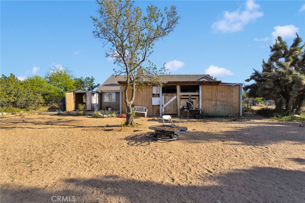 6414 Nielson Road Phelan, CA 92371 - Photo 59 of 74 a front view of a house with garden