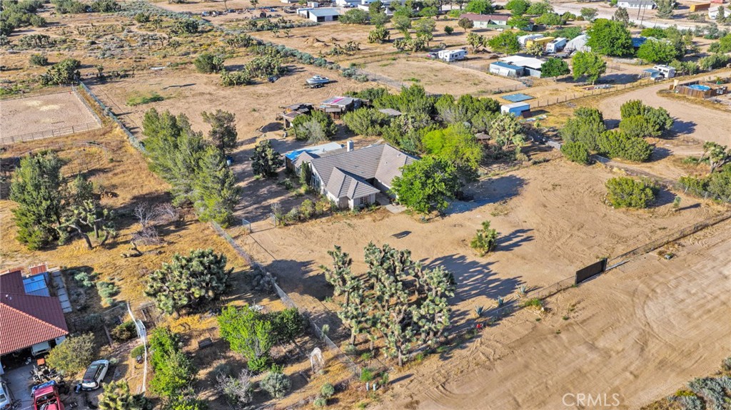 6414 Nielson Road Phelan, CA 92371 - Photo 69 of 74 an aerial view of a house with a yard and lake view