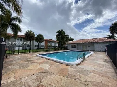 a view of outdoor space swimming pool and furniture