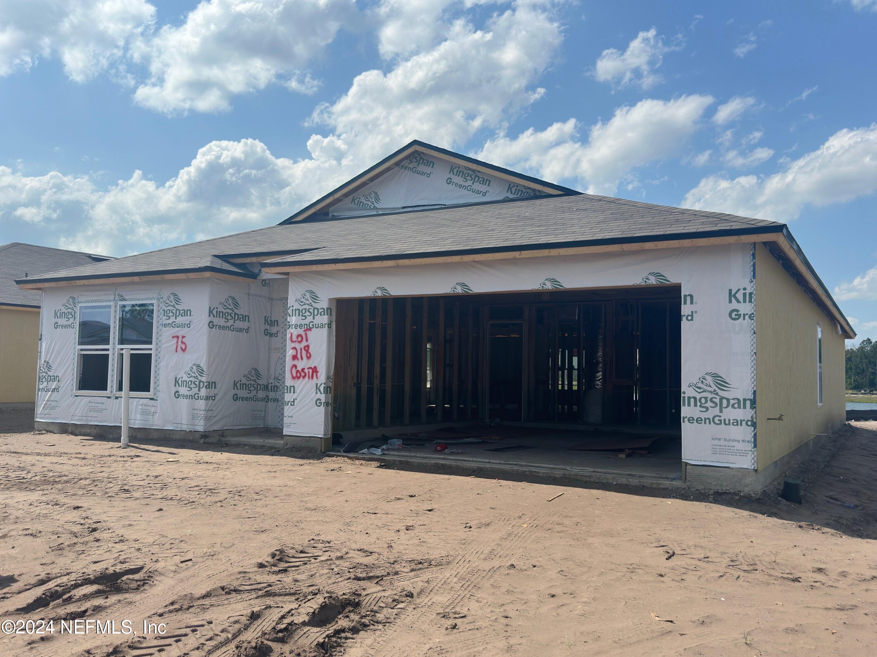 75 Hulett Wds Road Palm Coast, FL 32137 - Photo 1 of 38 a front view of a house