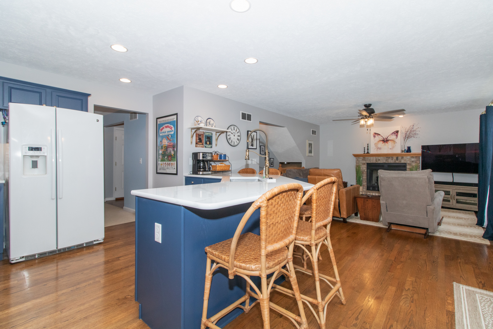 2973 Three Eagles Street Normal, IL 61761 - Photo 13 of 56 a dining hall with stainless steel appliances granite countertop a table chairs and a refrigerator