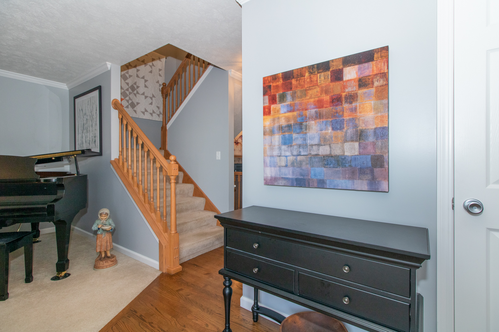 2973 Three Eagles Street Normal, IL 61761 - Photo 2 of 56 a view of entryway and hall with wooden floor