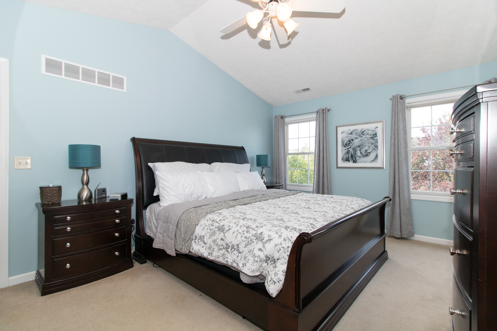 2973 Three Eagles Street Normal, IL 61761 - Photo 31 of 56 a bedroom with a bed and a chandelier