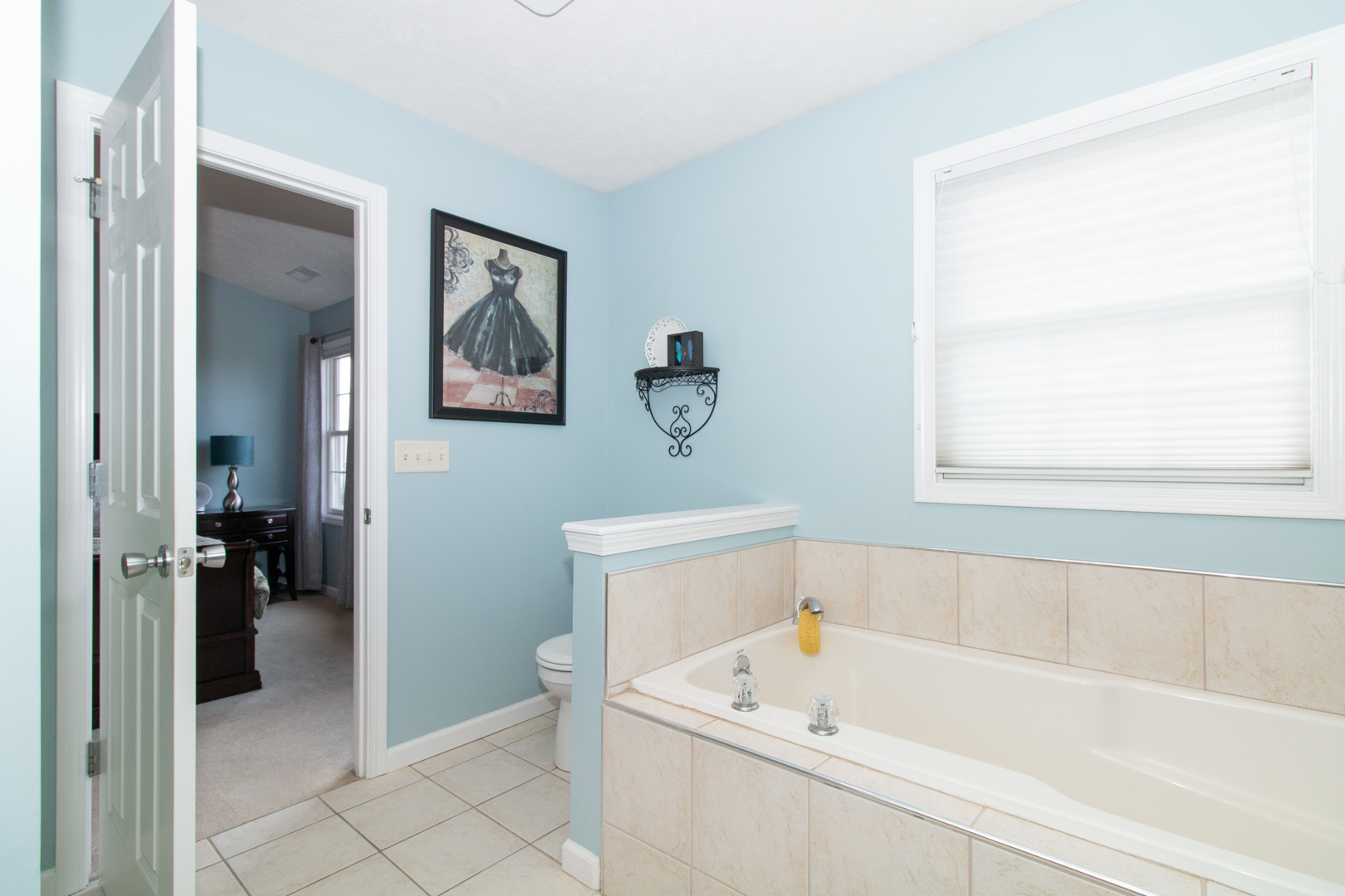 2973 Three Eagles Street Normal, IL 61761 - Photo 34 of 56 a bathroom with a bathtub and a shower