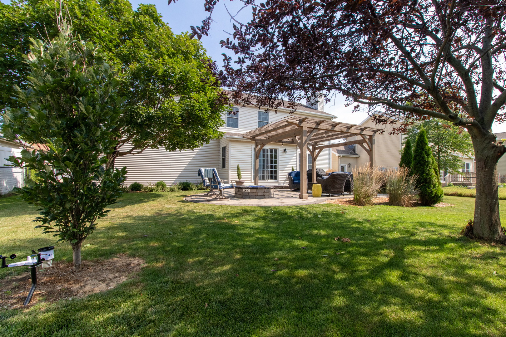 2973 Three Eagles Street Normal, IL 61761 - Photo 52 of 56 a house view with a sitting space and garden