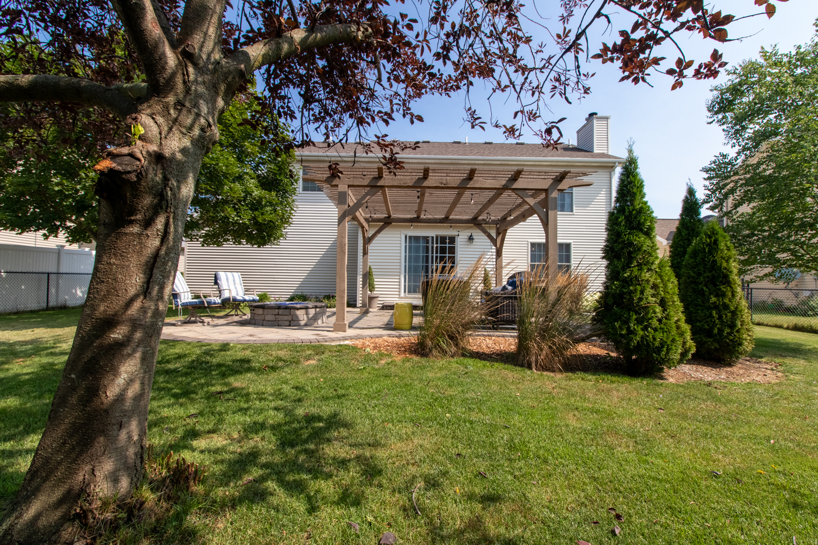 2973 Three Eagles Street Normal, IL 61761 - Photo 53 of 56 a view of a house with backyard porch and sitting area