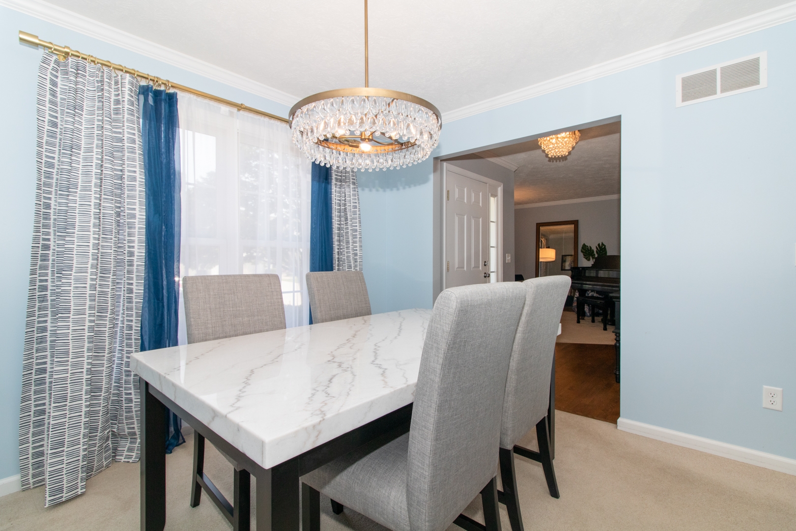 2973 Three Eagles Street Normal, IL 61761 - Photo 6 of 56 a view of a dining room with furniture window and wooden floor