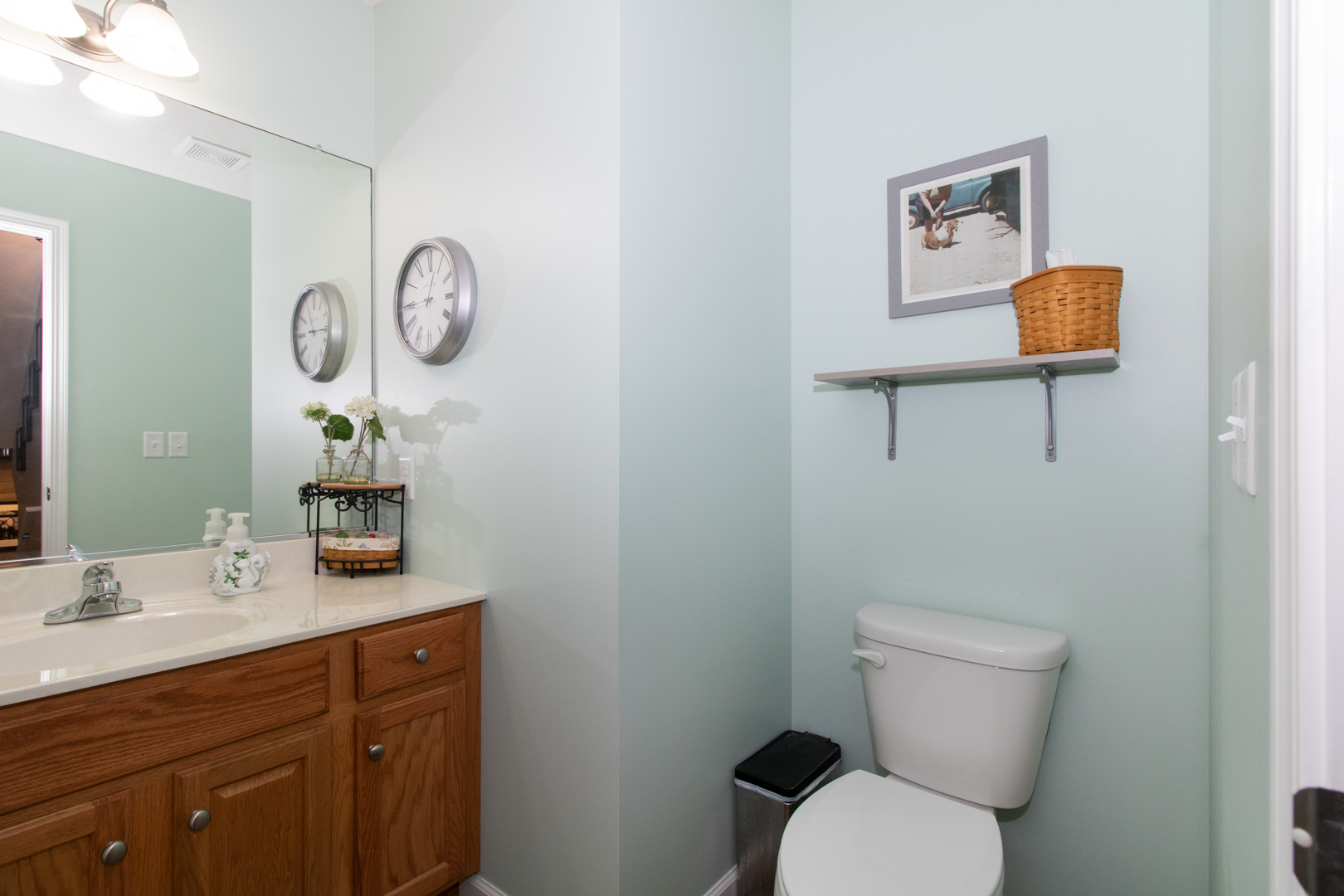 2973 Three Eagles Street Normal, IL 61761 - Photo 8 of 56 a bathroom with a toilet a sink and mirror