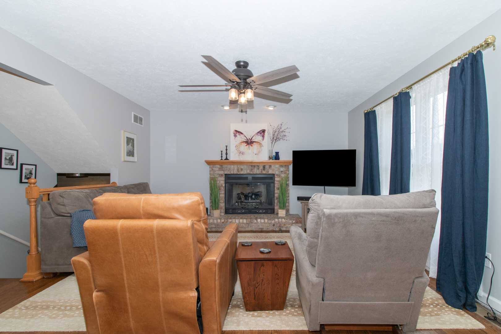 2973 Three Eagles Street Normal, IL 61761 - Photo 10 of 56 a living room with furniture and a flat screen tv