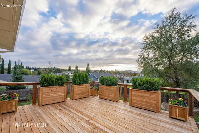 a view of roof deck with patio