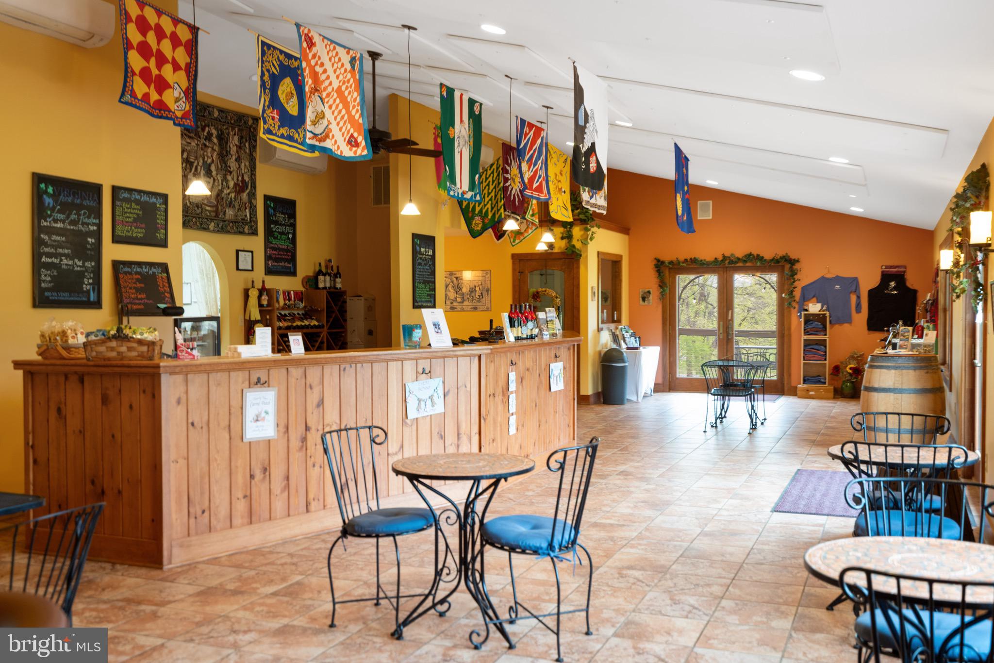 92 School House Road Washington, VA 22747 - Photo 18 of 68 a dining room with furniture and wooden floor