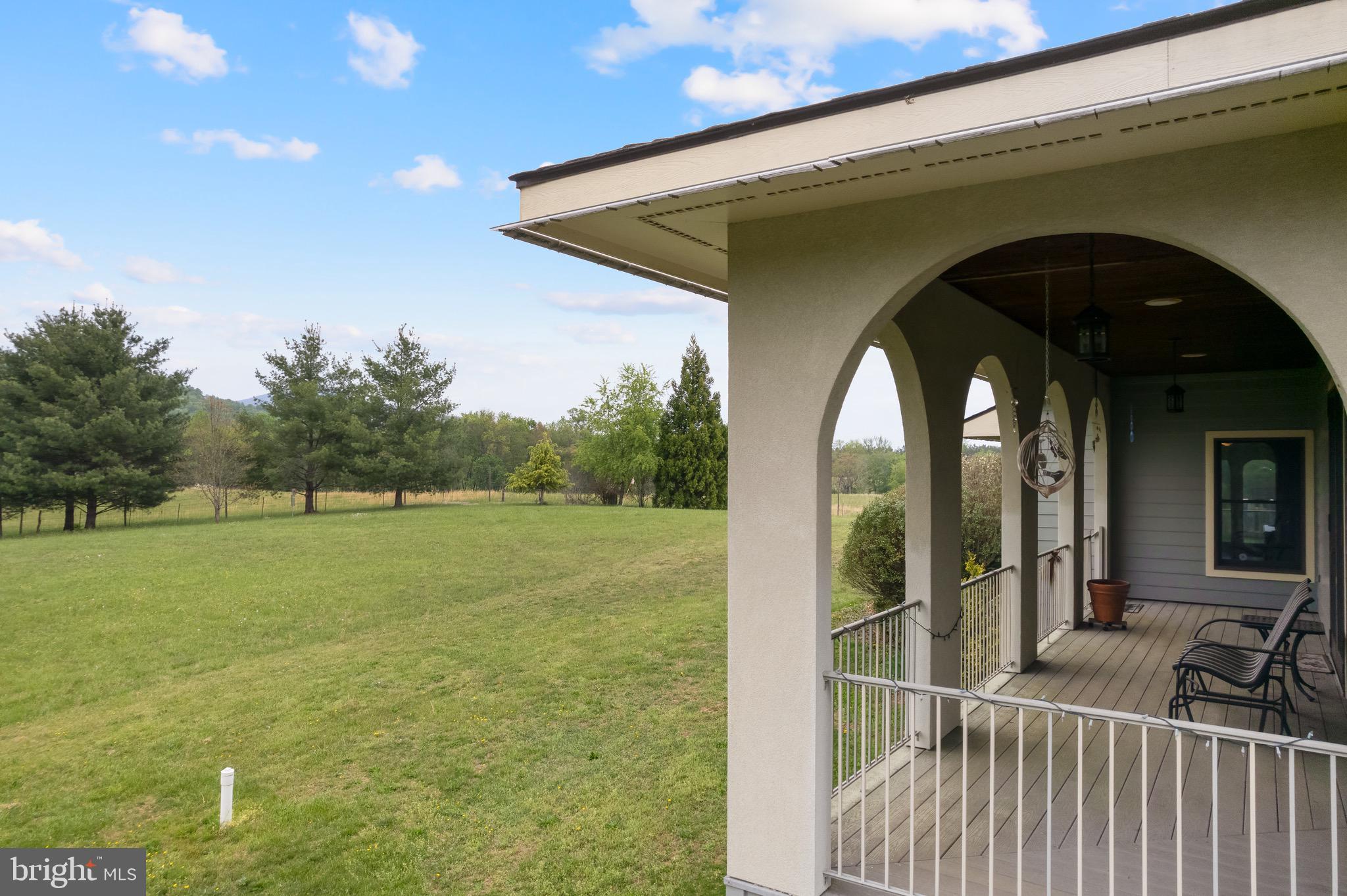 92 School House Road Washington, VA 22747 - Photo 4 of 68 a view of a balcony with furniture