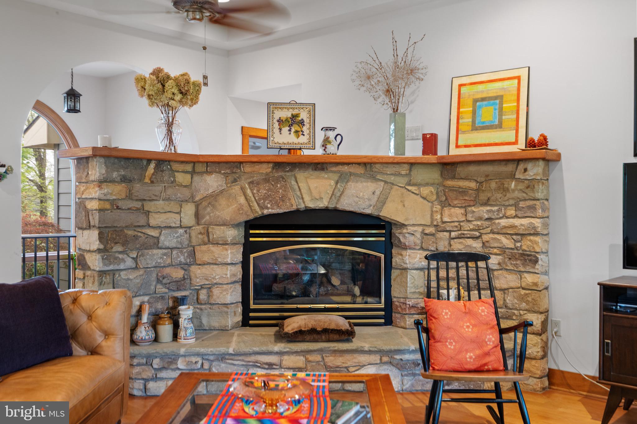 92 School House Road Washington, VA 22747 - Photo 49 of 68 a living room with furniture and a fireplace