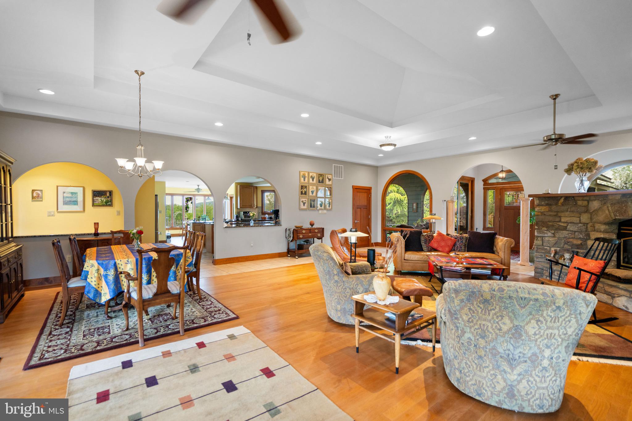 92 School House Road Washington, VA 22747 - Photo 51 of 68 a living room with fireplace furniture and a chandelier