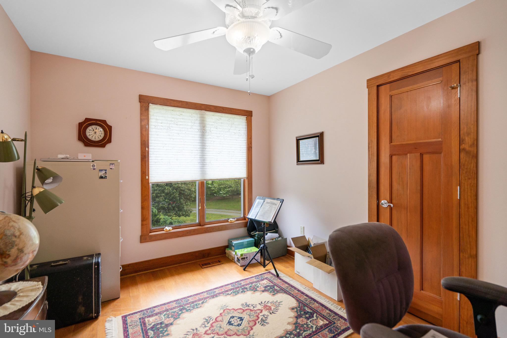 92 School House Road Washington, VA 22747 - Photo 52 of 68 a living room with furniture and a window