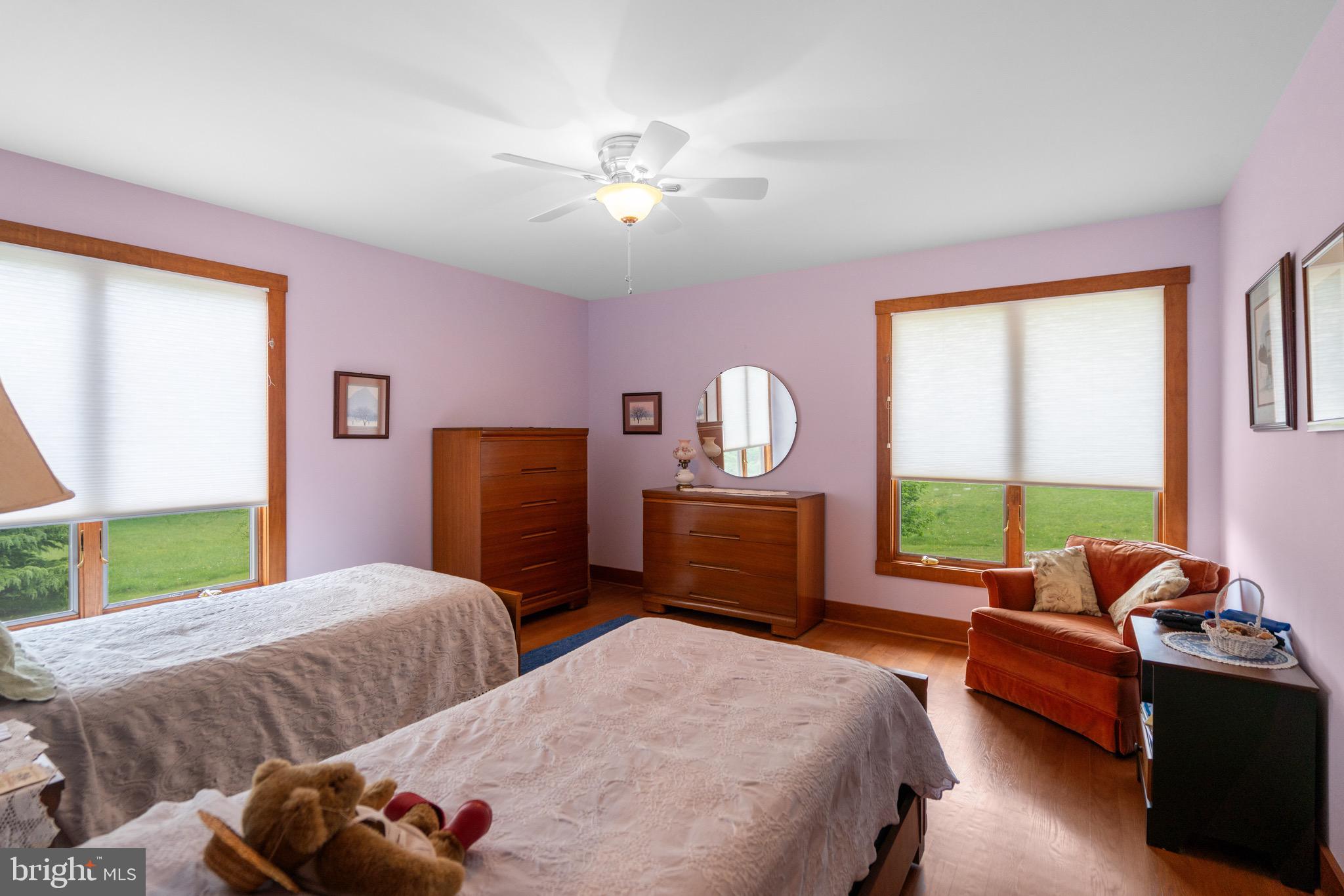 92 School House Road Washington, VA 22747 - Photo 55 of 68 a bedroom with two beds and a large window