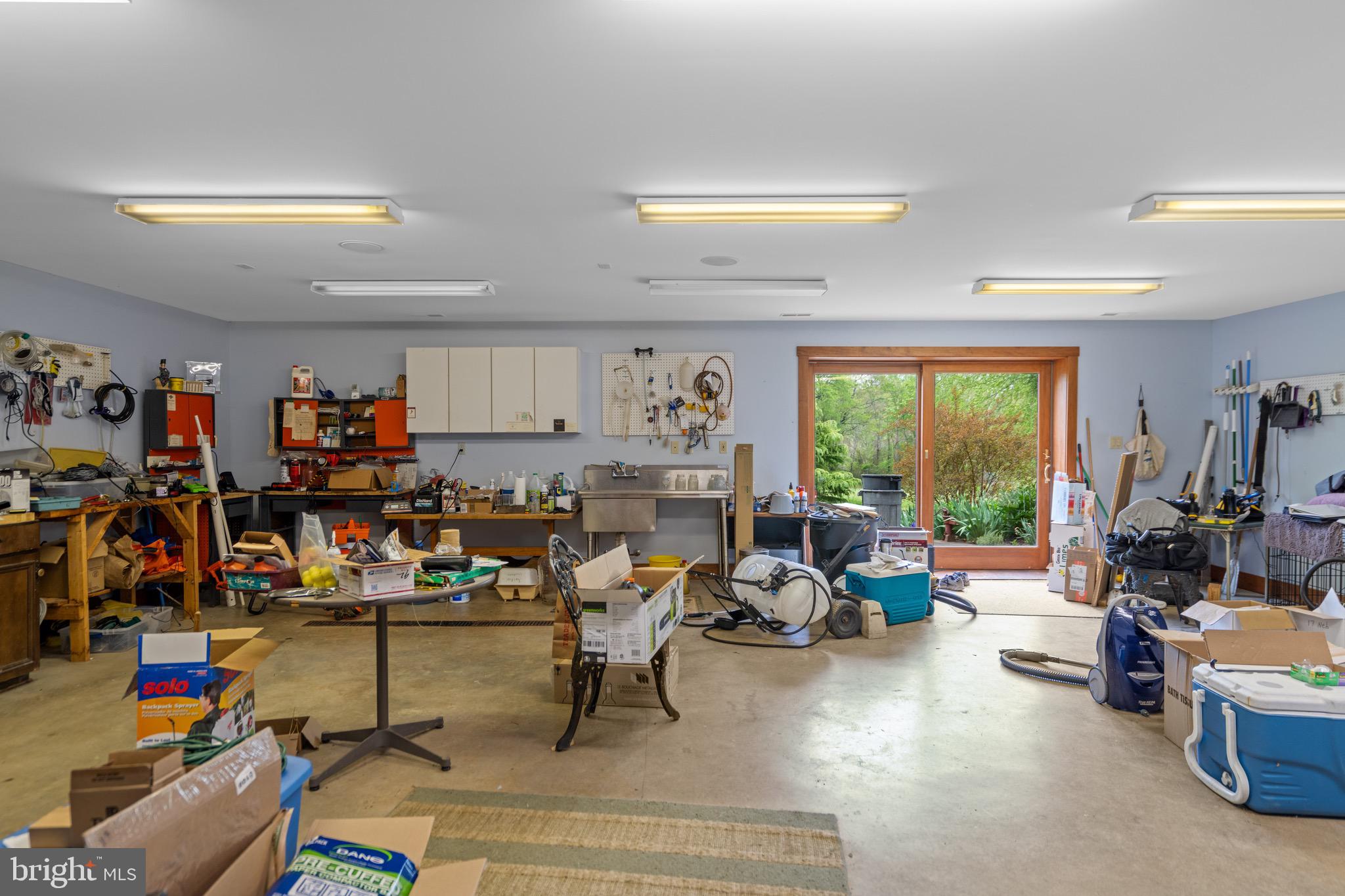 92 School House Road Washington, VA 22747 - Photo 68 of 68 a living room with lots of furniture and a flat screen tv