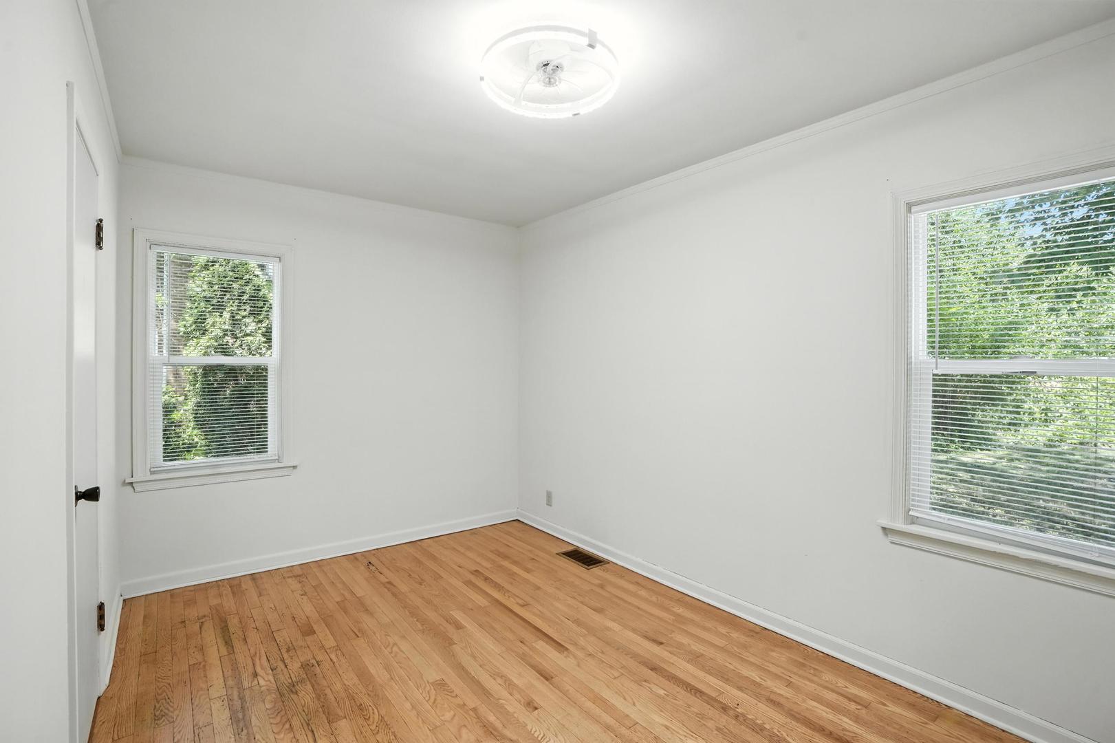 21149 Main Street Matteson, IL 60443 - Photo 7 of 20 an empty room with a window