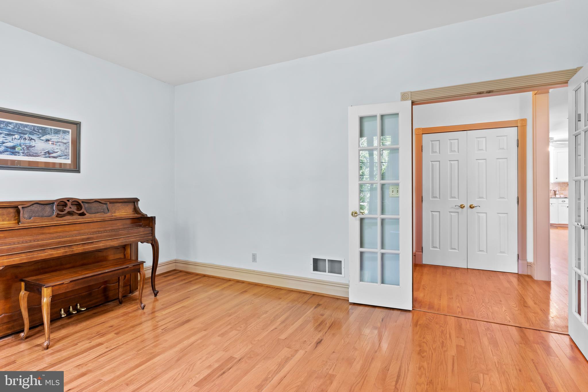 176 Richland Road Carlisle, PA 17015 - Photo 21 of 59 an empty room with wooden floor closet and windows
