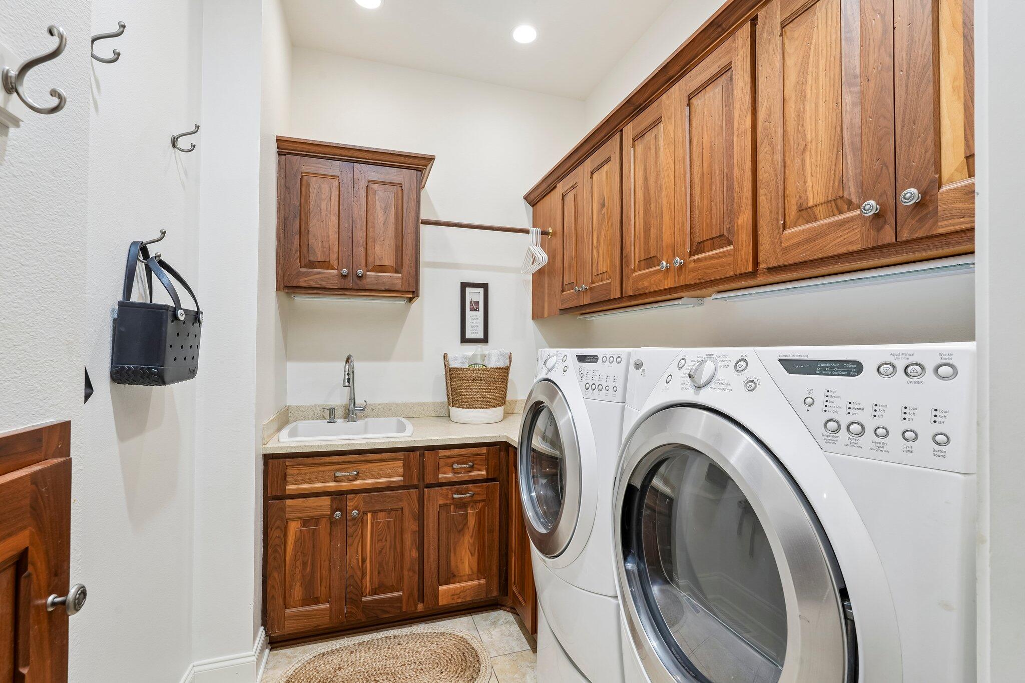 W343N6293 South Bayview Road Oconomowoc, WI 53066 - Photo 53 of 104 Laundry on main, second laundry in LL