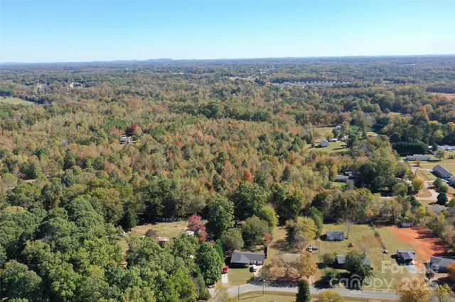 an aerial view of a house with a outdoor space