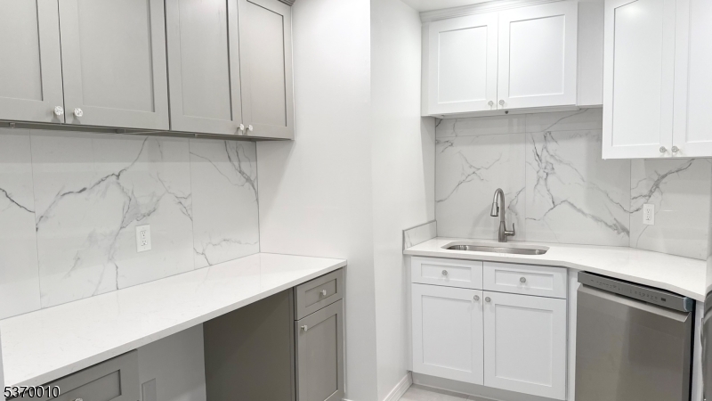 76 Jamestown Road Bernards, NJ 07920 - Photo 2 of 20 a kitchen with stainless steel appliances granite countertop white cabinets sink and dishwasher