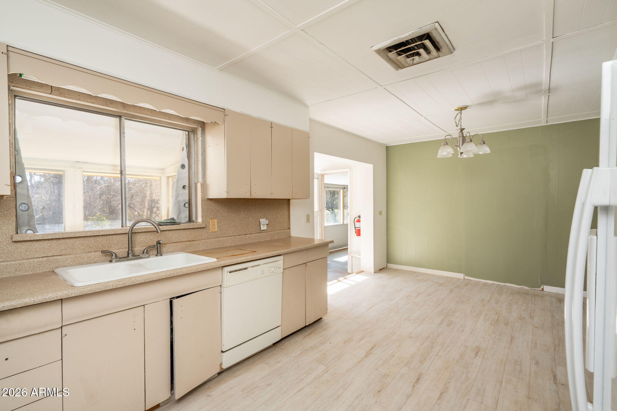 3775 East Sycamore Lane Rimrock, AZ 86335 - Photo 12 of 40 a kitchen with a sink and large window