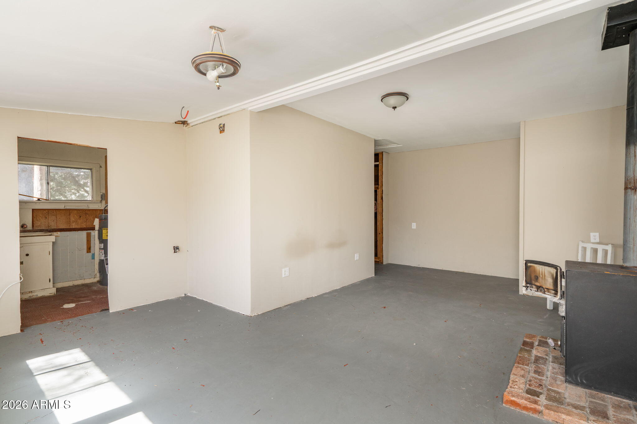 3775 East Sycamore Lane Rimrock, AZ 86335 - Photo 18 of 40 a view of empty room with wooden floor