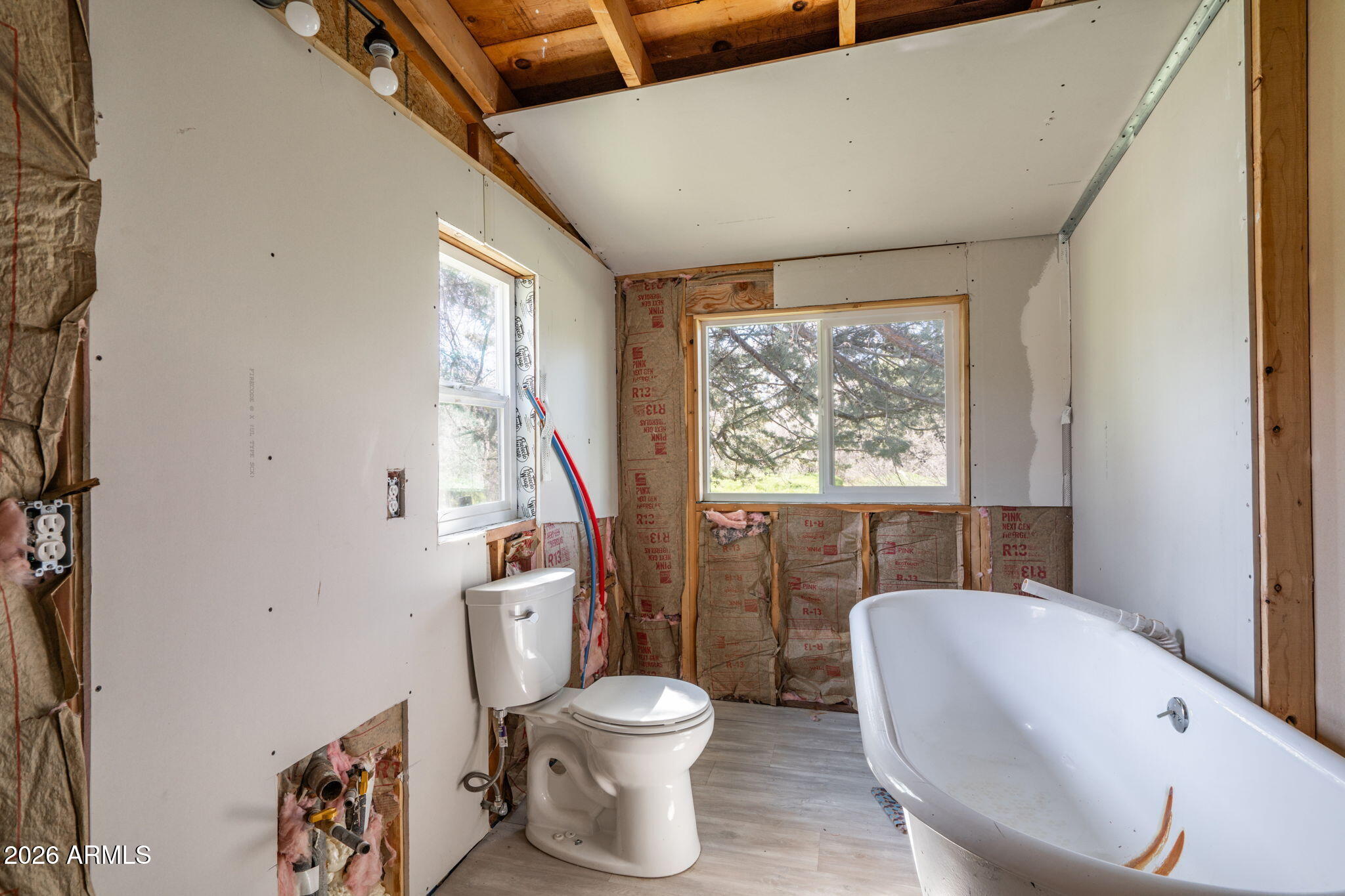 3775 East Sycamore Lane Rimrock, AZ 86335 - Photo 25 of 40 a bathroom with a toilet sink and mirror