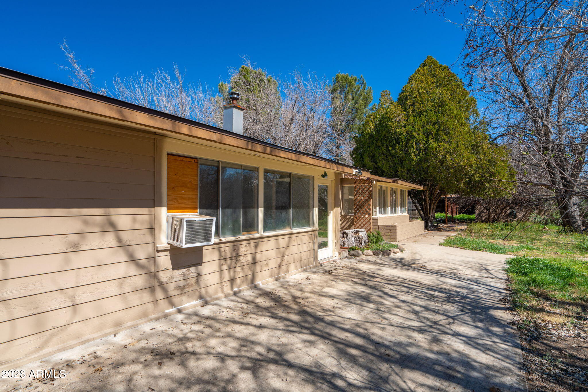 3775 East Sycamore Lane Rimrock, AZ 86335 - Photo 29 of 40 a view of a house with a yard