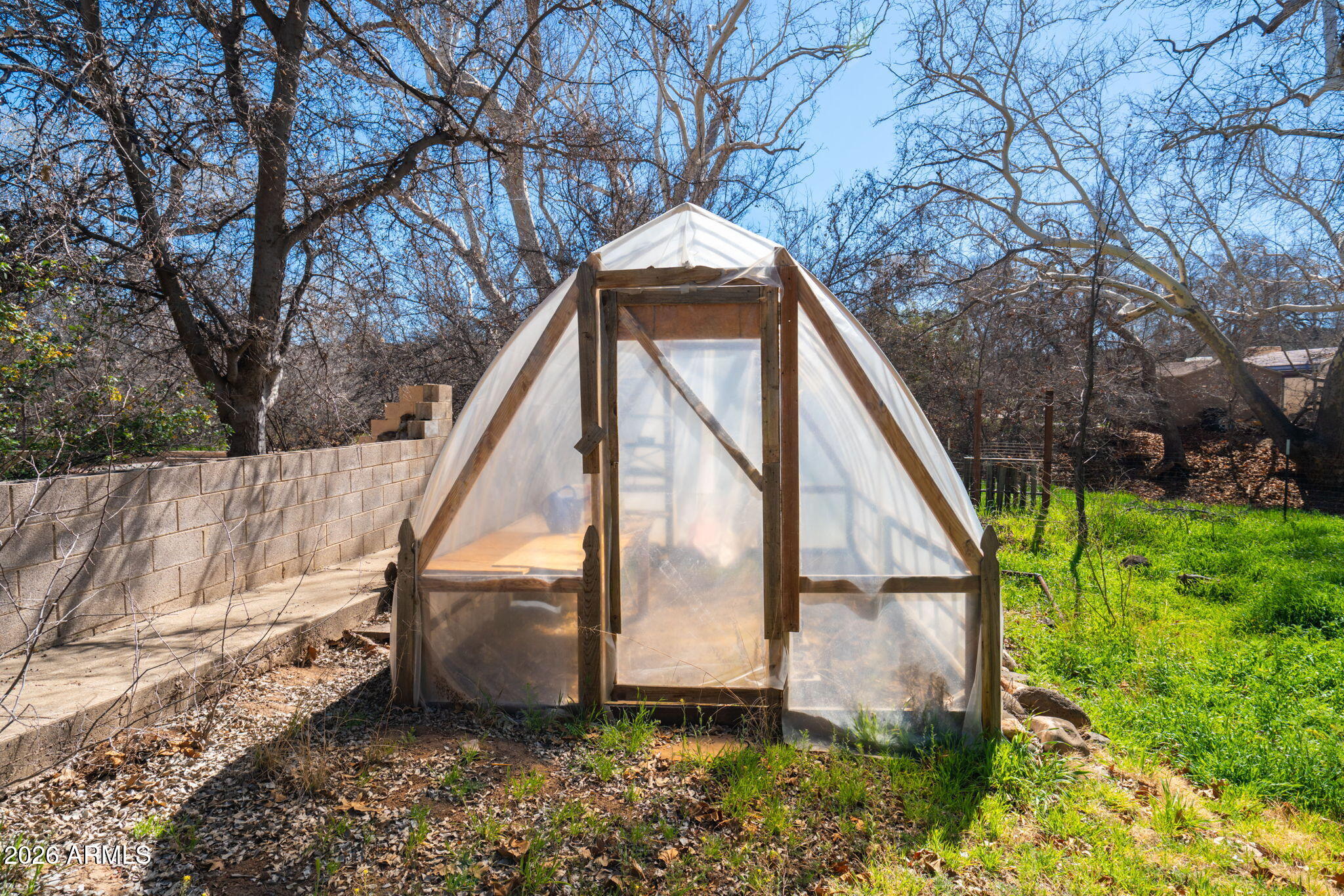 3775 East Sycamore Lane Rimrock, AZ 86335 - Photo 34 of 40 a backyard of a house with lots of green space