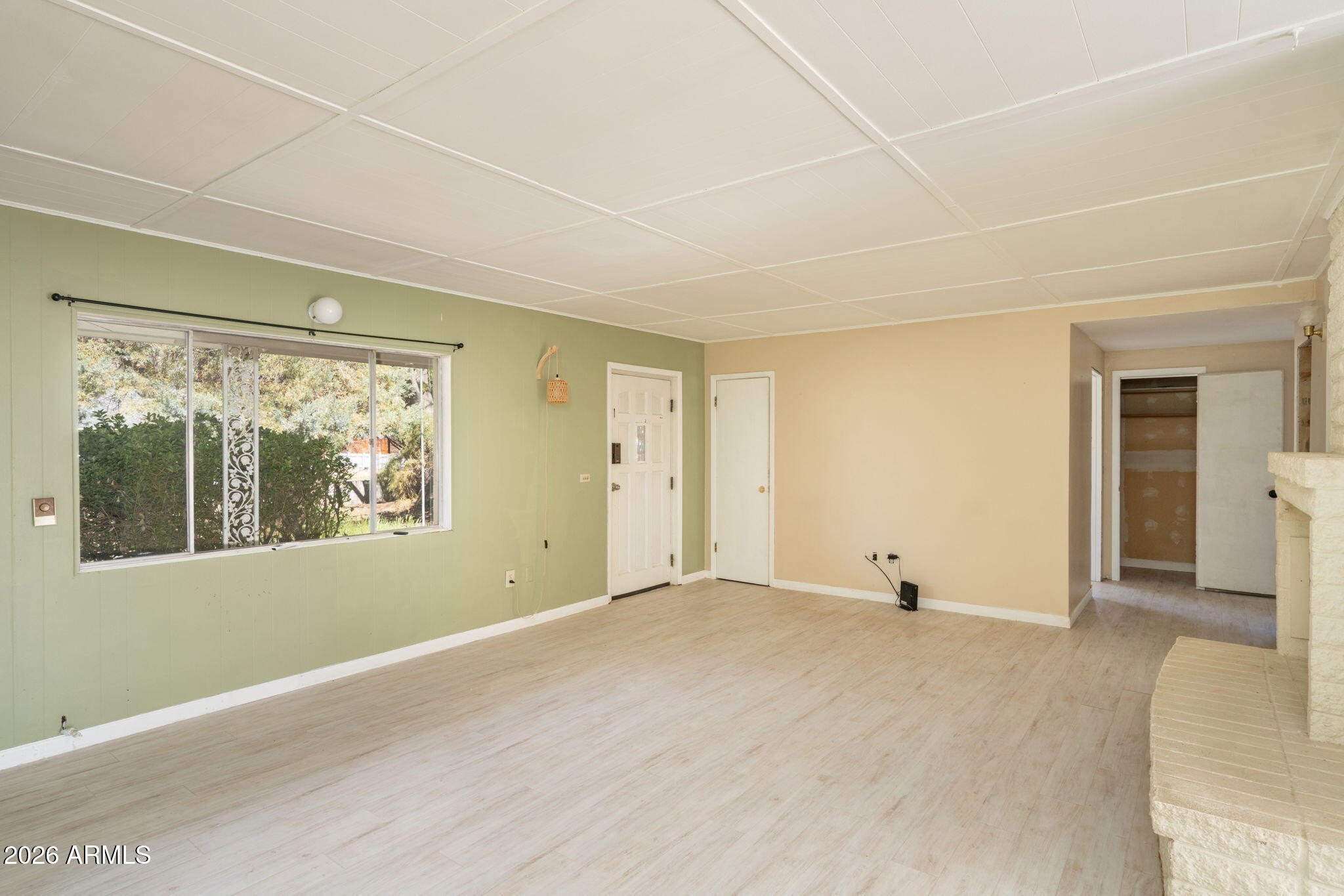 3775 East Sycamore Lane Rimrock, AZ 86335 - Photo 8 of 40 a view of an empty room with a window