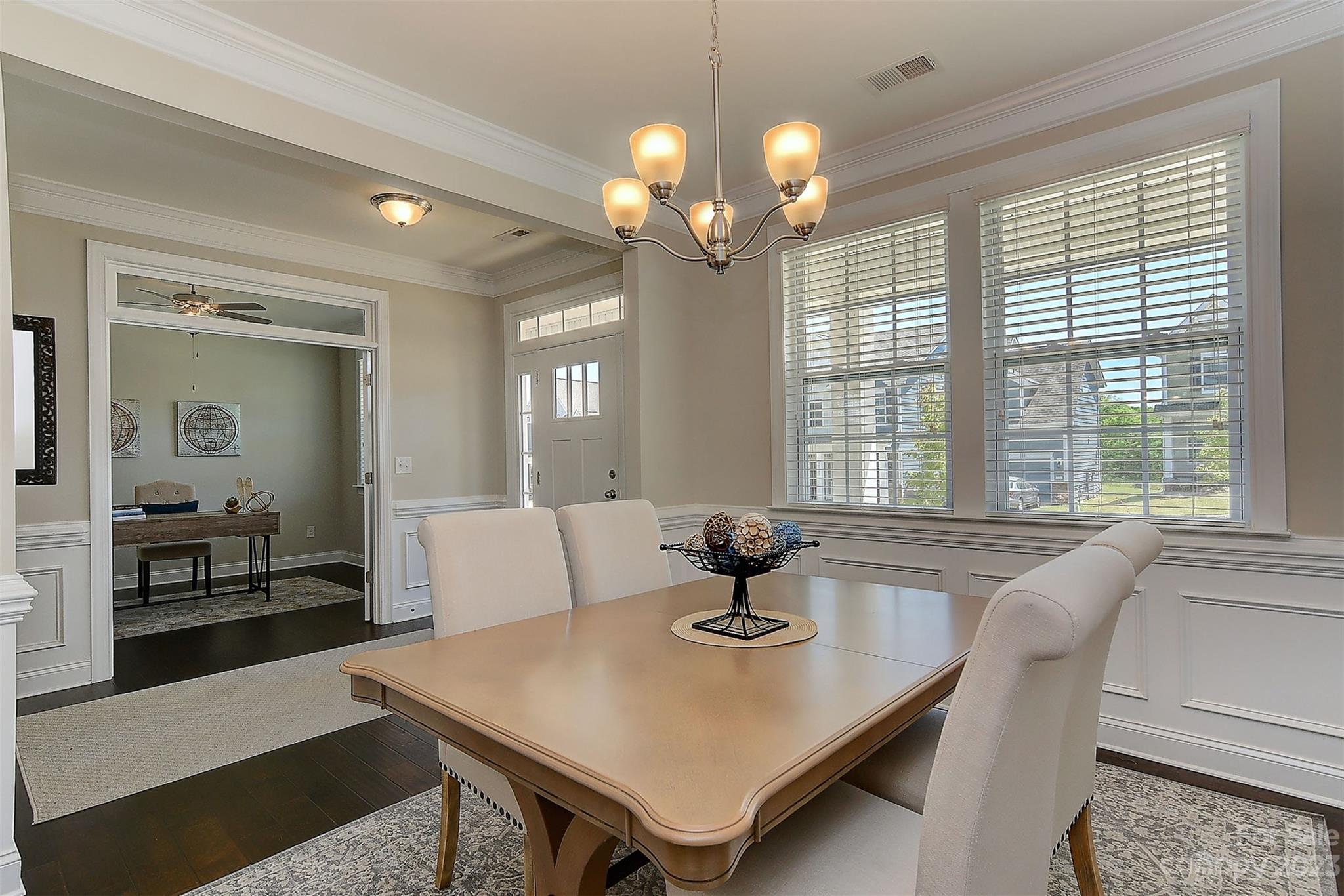 11266 Trailside Road Concord, NC 28027 - Photo 15 of 45 a living room with dining table and a large window