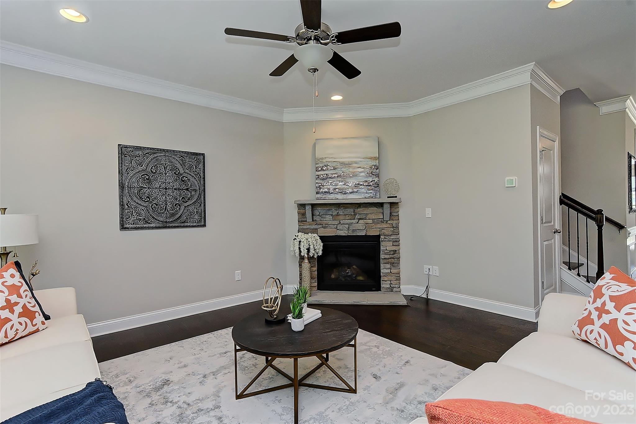 11266 Trailside Road Concord, NC 28027 - Photo 25 of 45 a living room with furniture and a fireplace