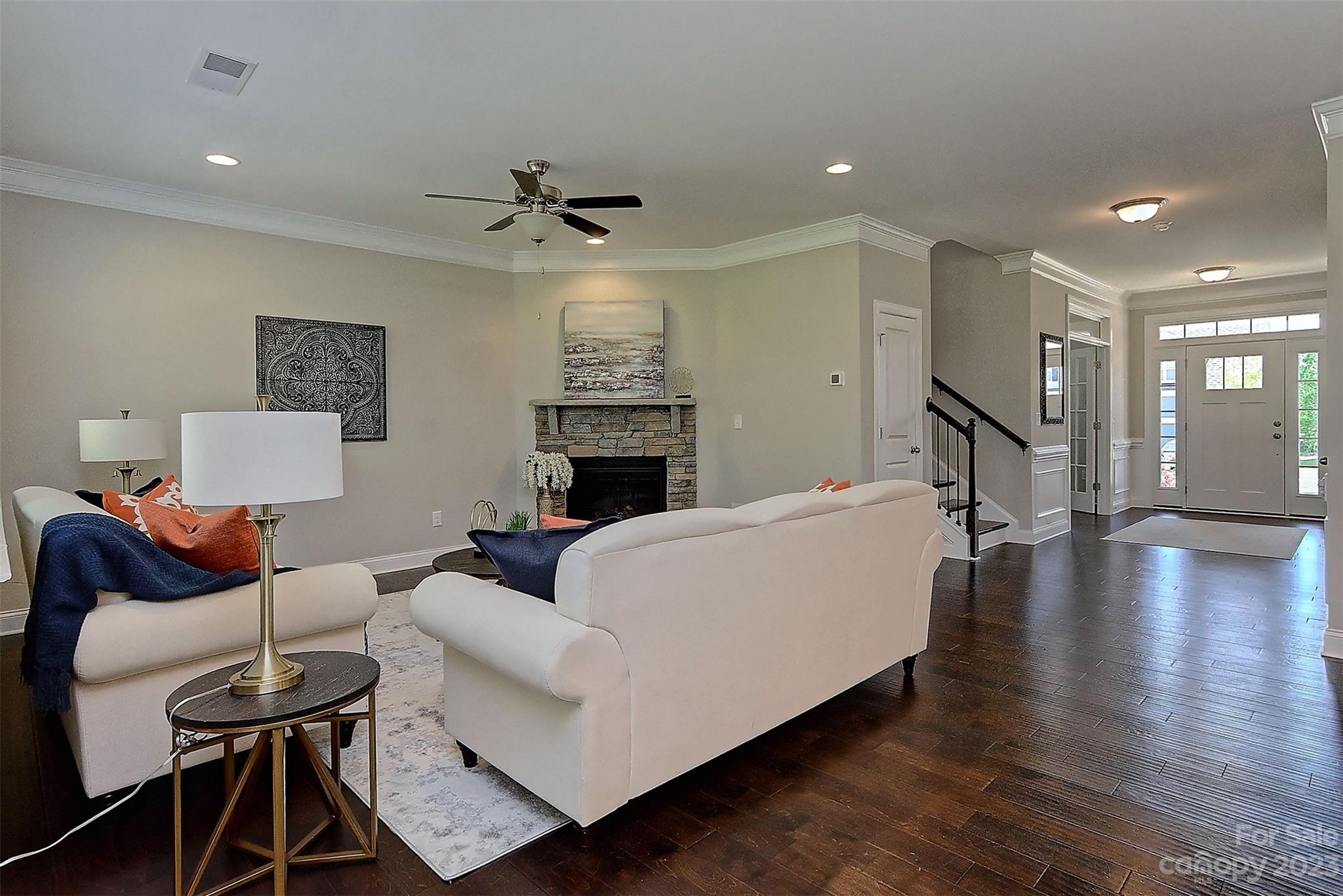 11266 Trailside Road Concord, NC 28027 - Photo 26 of 45 a living room with furniture and a wooden floor