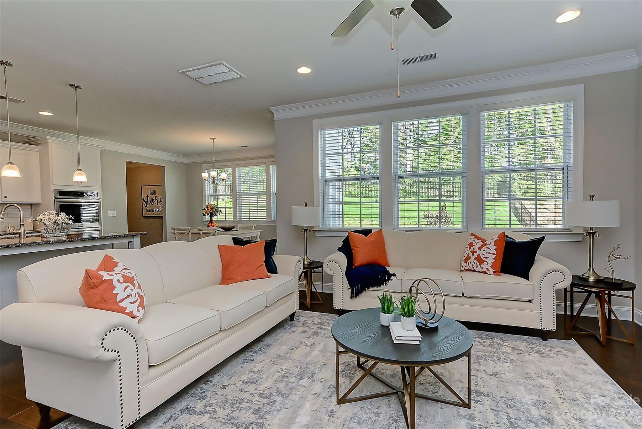 11266 Trailside Road Concord, NC 28027 - Photo 27 of 45 a living room with furniture and a large window