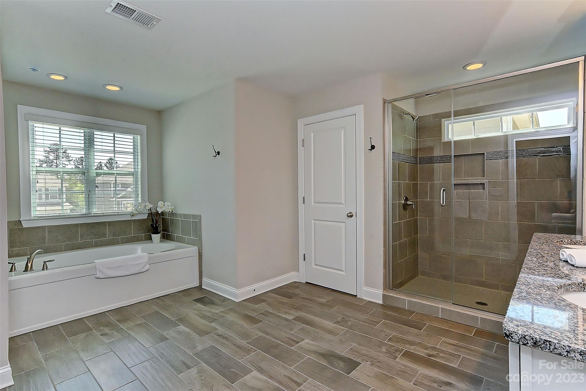 11266 Trailside Road Concord, NC 28027 - Photo 34 of 45 a bathroom with a sink toilet and shower