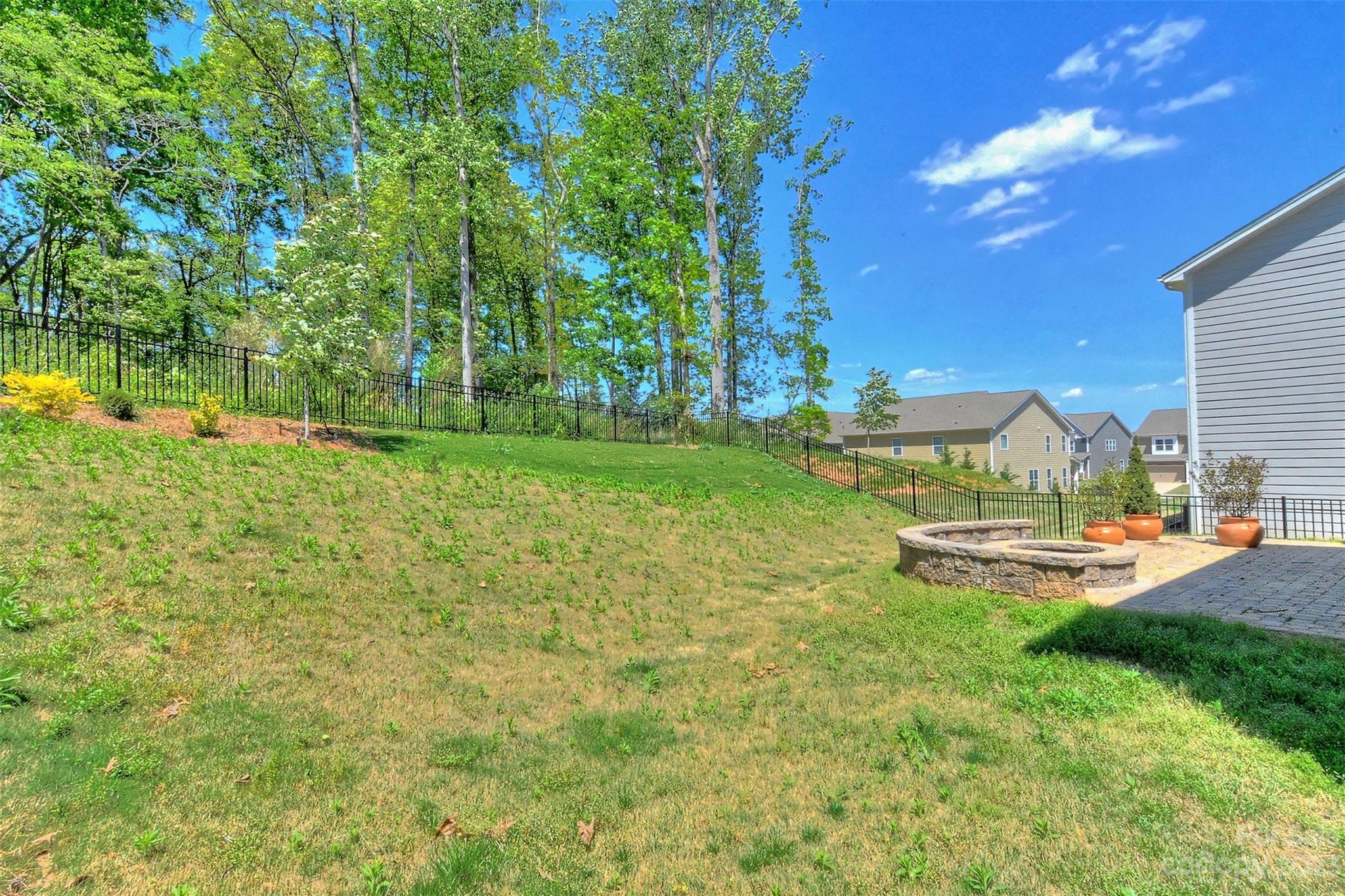 11266 Trailside Road Concord, NC 28027 - Photo 44 of 45 a view of a house with a yard and sitting area