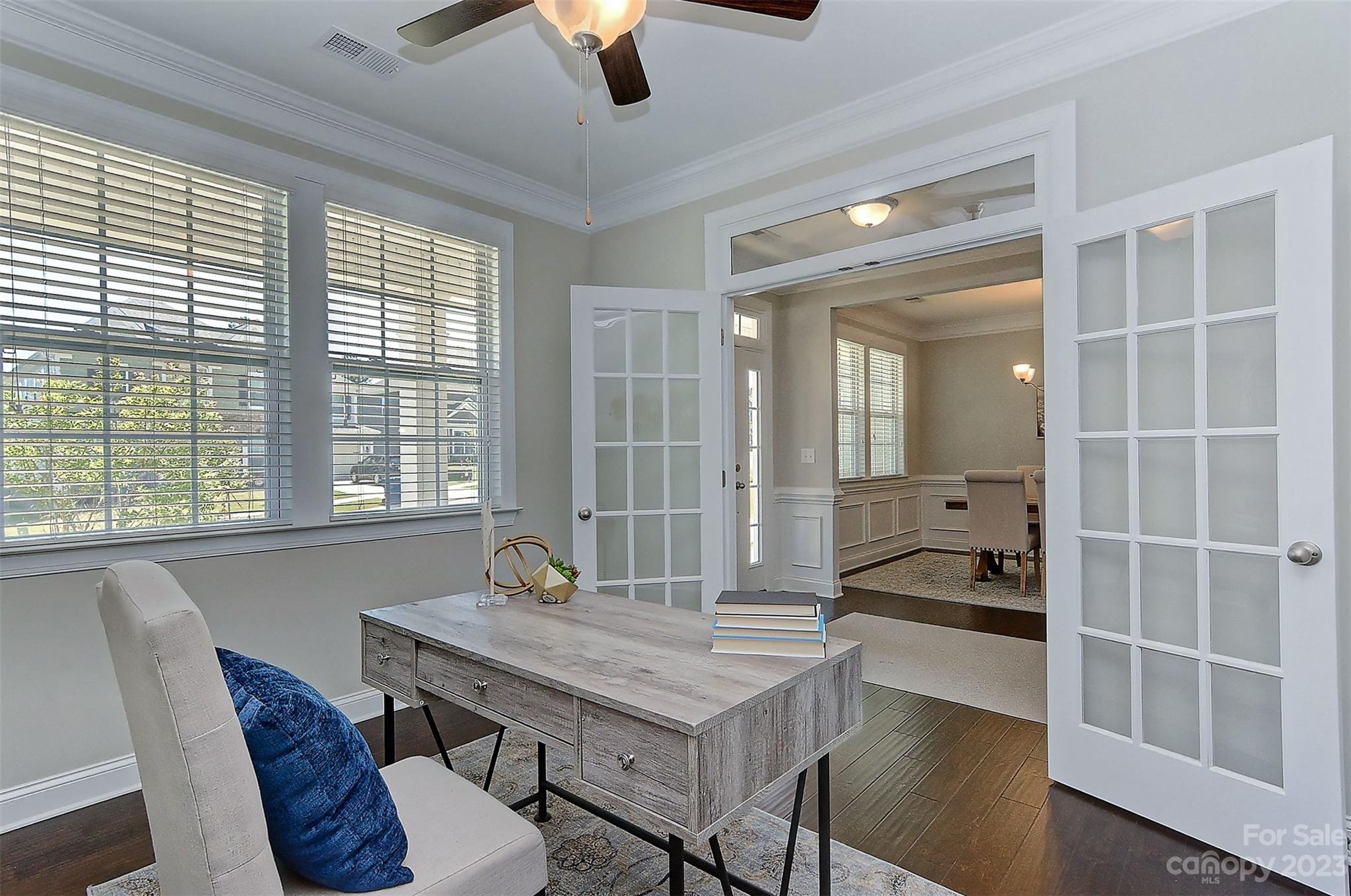 11266 Trailside Road Concord, NC 28027 - Photo 9 of 45 a view of a dining room with furniture window and wooden floor