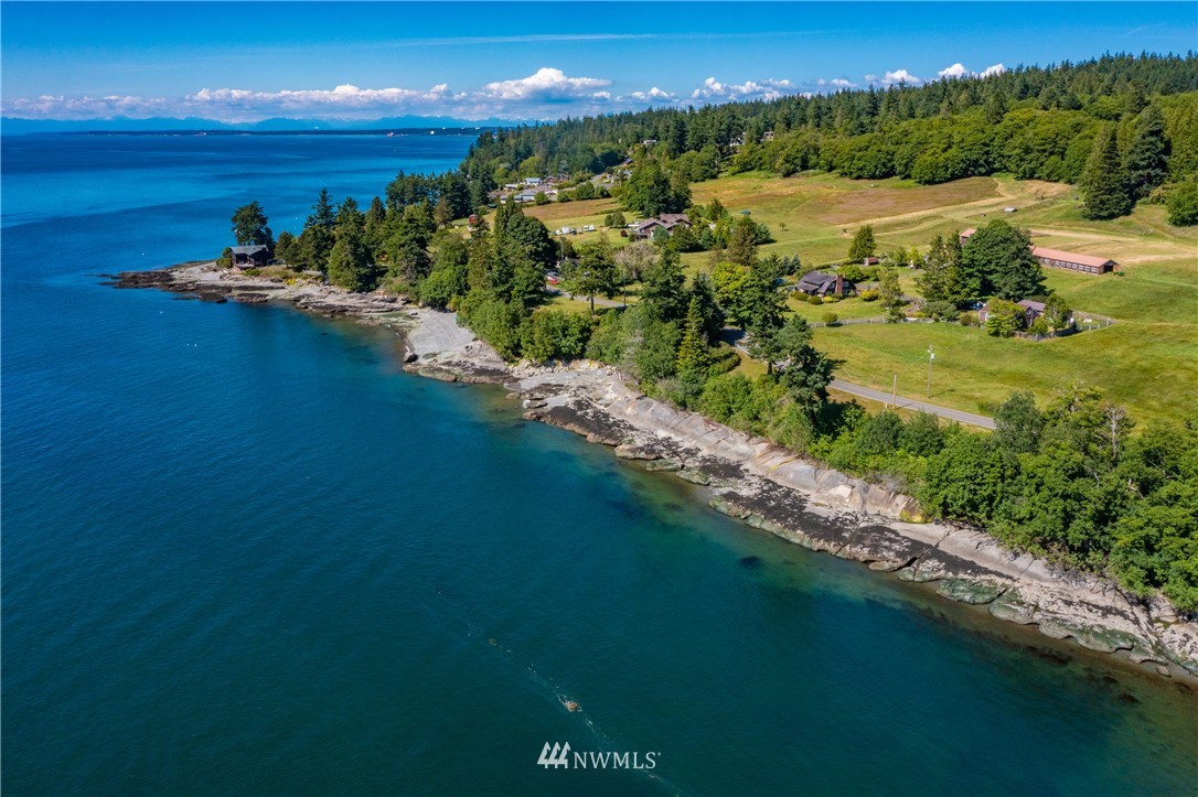 0 Blizard Road Lummi Island, WA 98262 - Photo 19 of 22 a view of a lake with a mountain