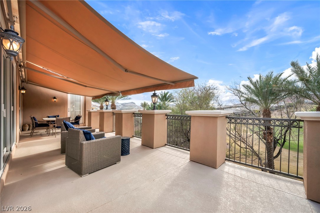 75 Luce Del Sole, Unit 3 Henderson, NV 89011 - Photo 23 of 56 Terrace patio and wind sensor awning