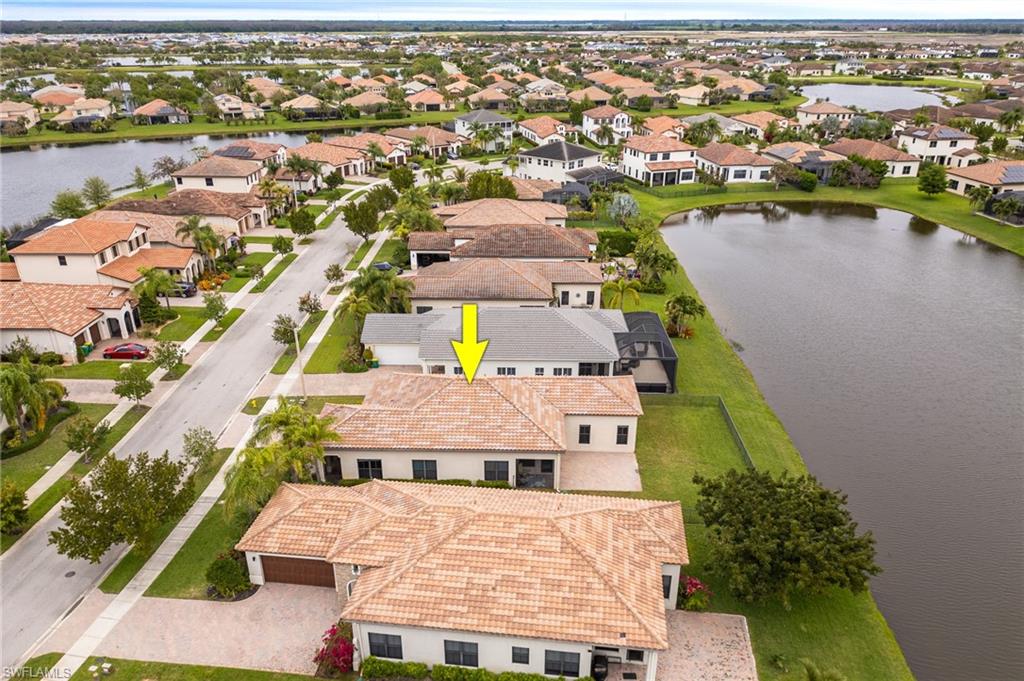5116 Salerno Street Ave Maria, FL 34142 - Photo 32 of 36 an aerial view of a house with outdoor space