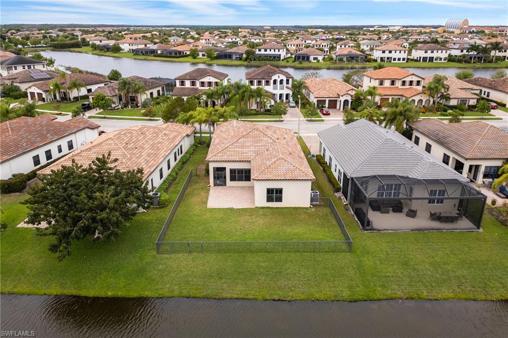 5116 Salerno Street Ave Maria, FL 34142 - Photo 33 of 36 an aerial view of a house