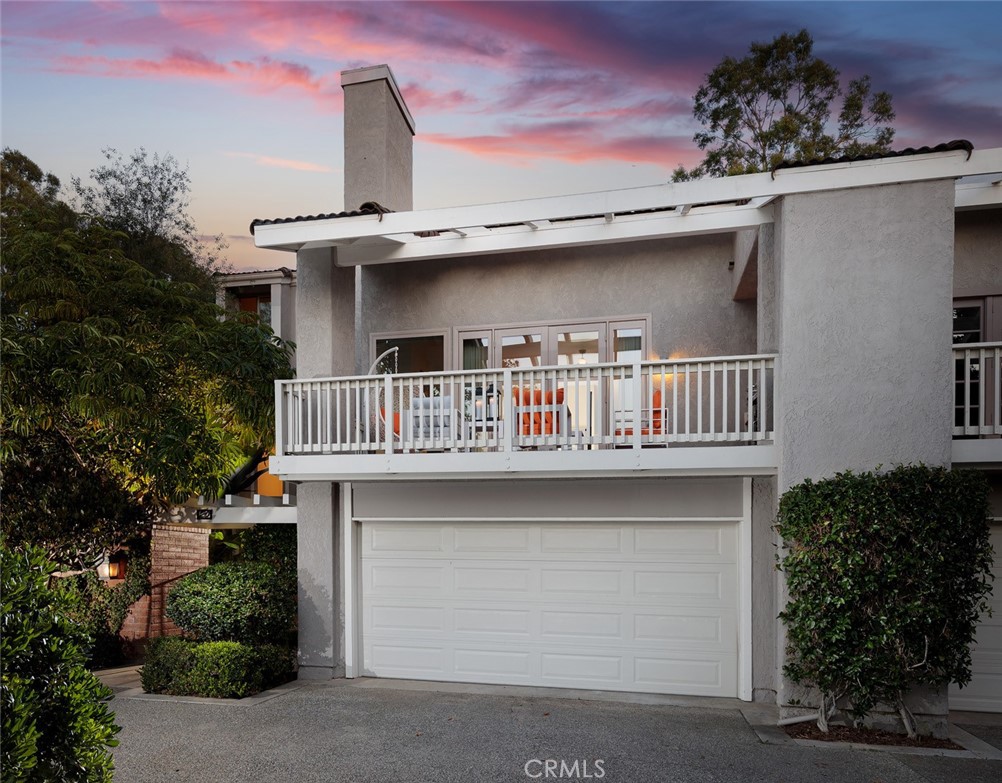 a front view of a house with balcony