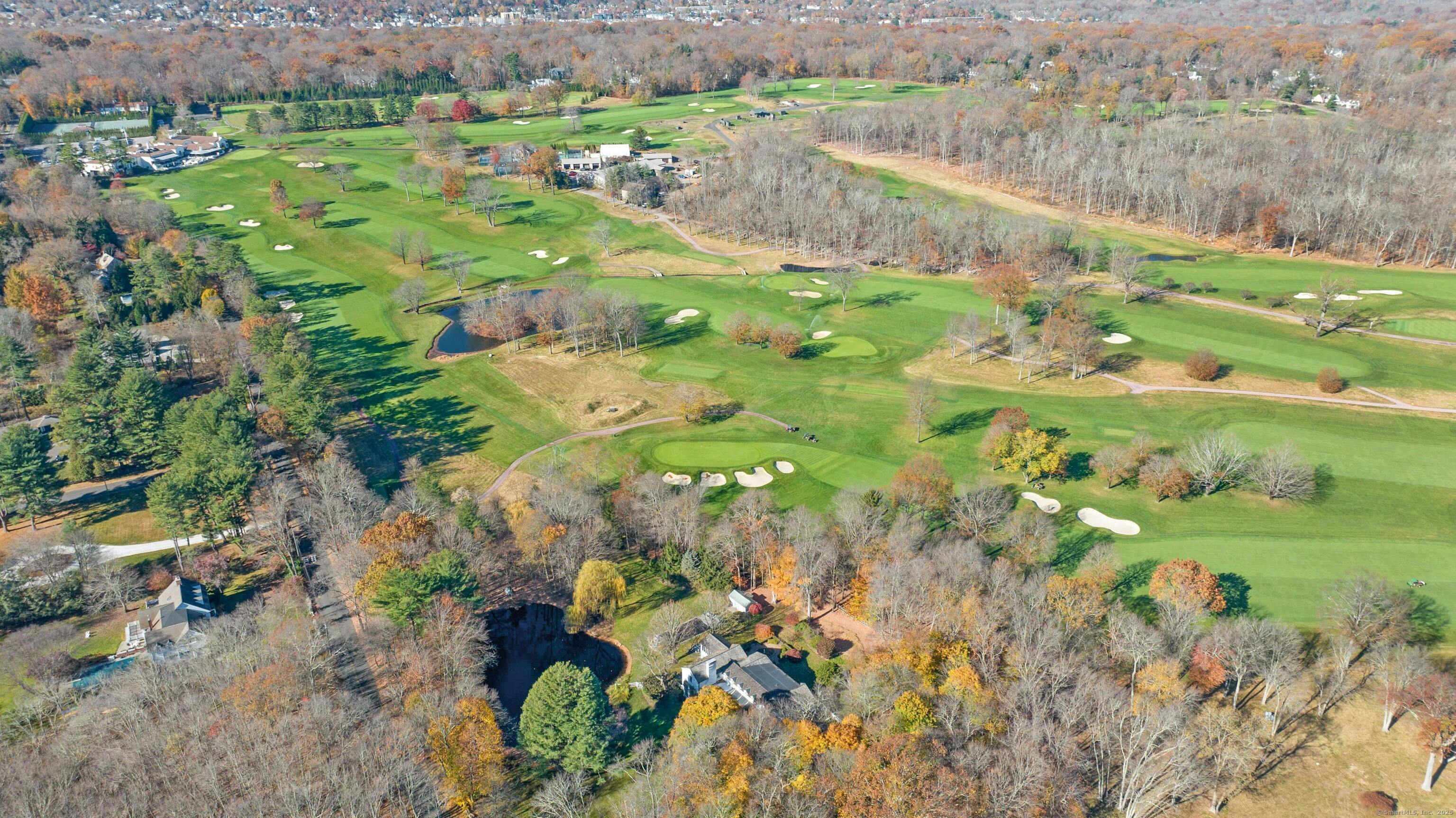 75 Hanson Road Darien, CT 06820 - Photo 29 of 30 a view of a lake with a city