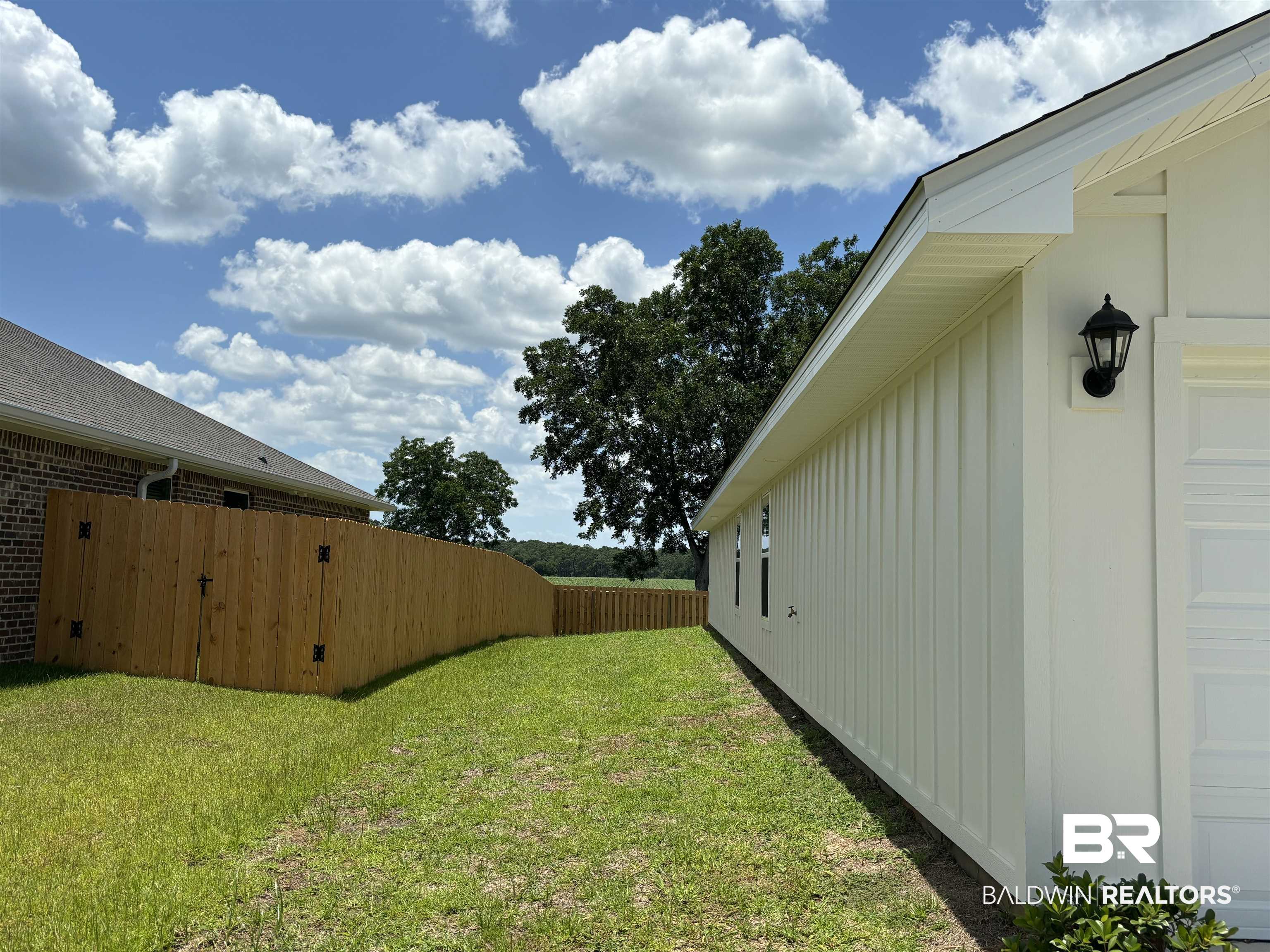 24504 Ponder Loop Loxley, AL 36551 - Photo 8 of 50 Left Side of House