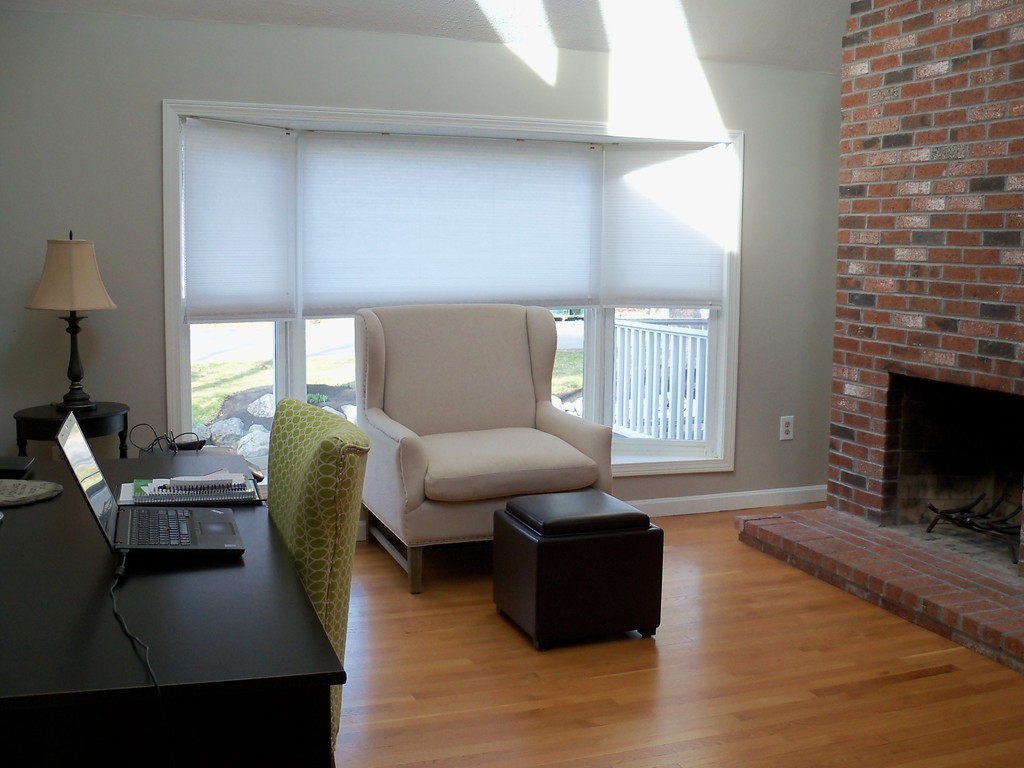 8 Hillcrest Road Canton, MA 02021 - Photo 20 of 29 a living room with furniture and a fireplace