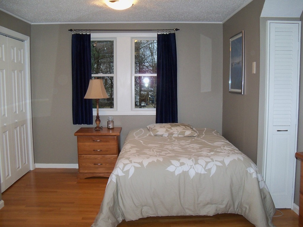 8 Hillcrest Road Canton, MA 02021 - Photo 22 of 29 a bedroom with a bed and a window