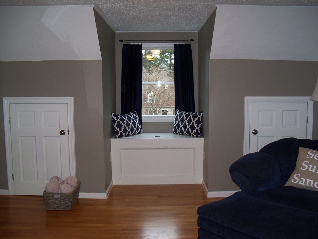8 Hillcrest Road Canton, MA 02021 - Photo 23 of 29 a living room with furniture and wooden floor