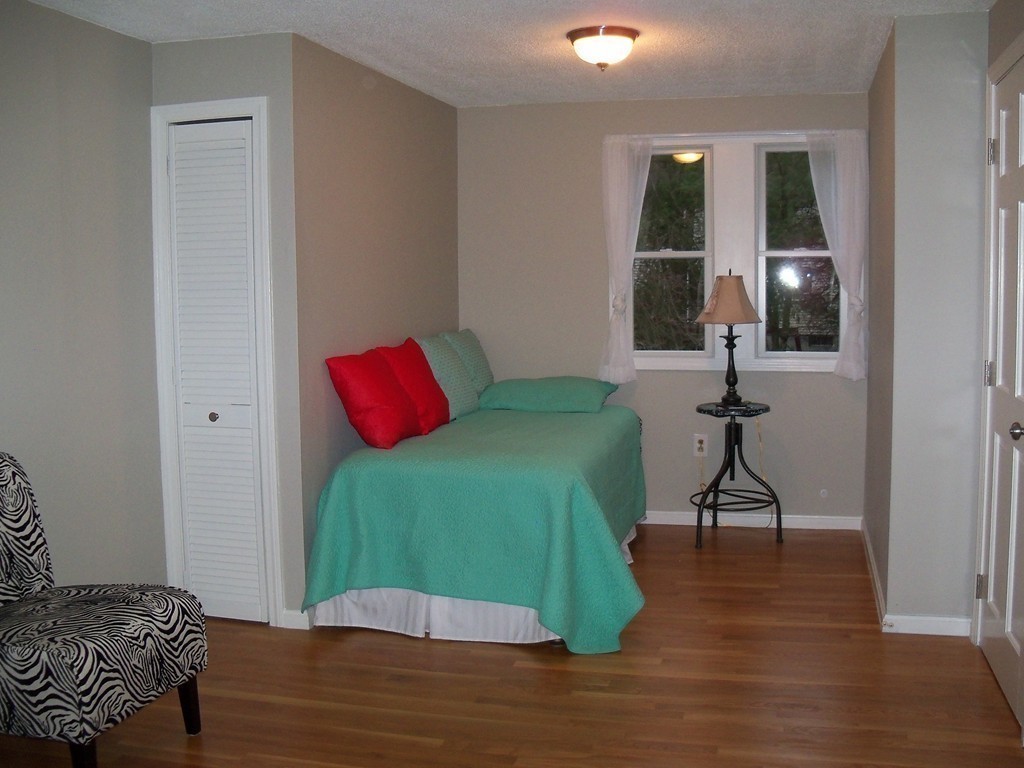 8 Hillcrest Road Canton, MA 02021 - Photo 26 of 29 a bedroom with a bed and a window